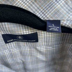 Only worn once. Button down. Never washed at home